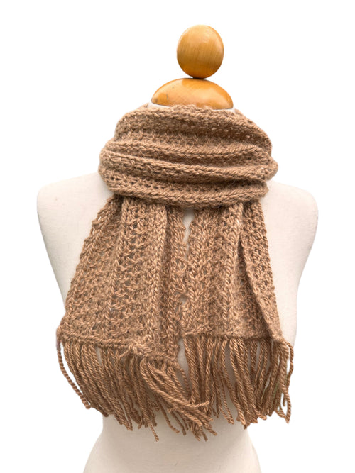 Oak Crest Alpacas and More hand knit tan alpaca wool scarf with fringe detail on a mannequin