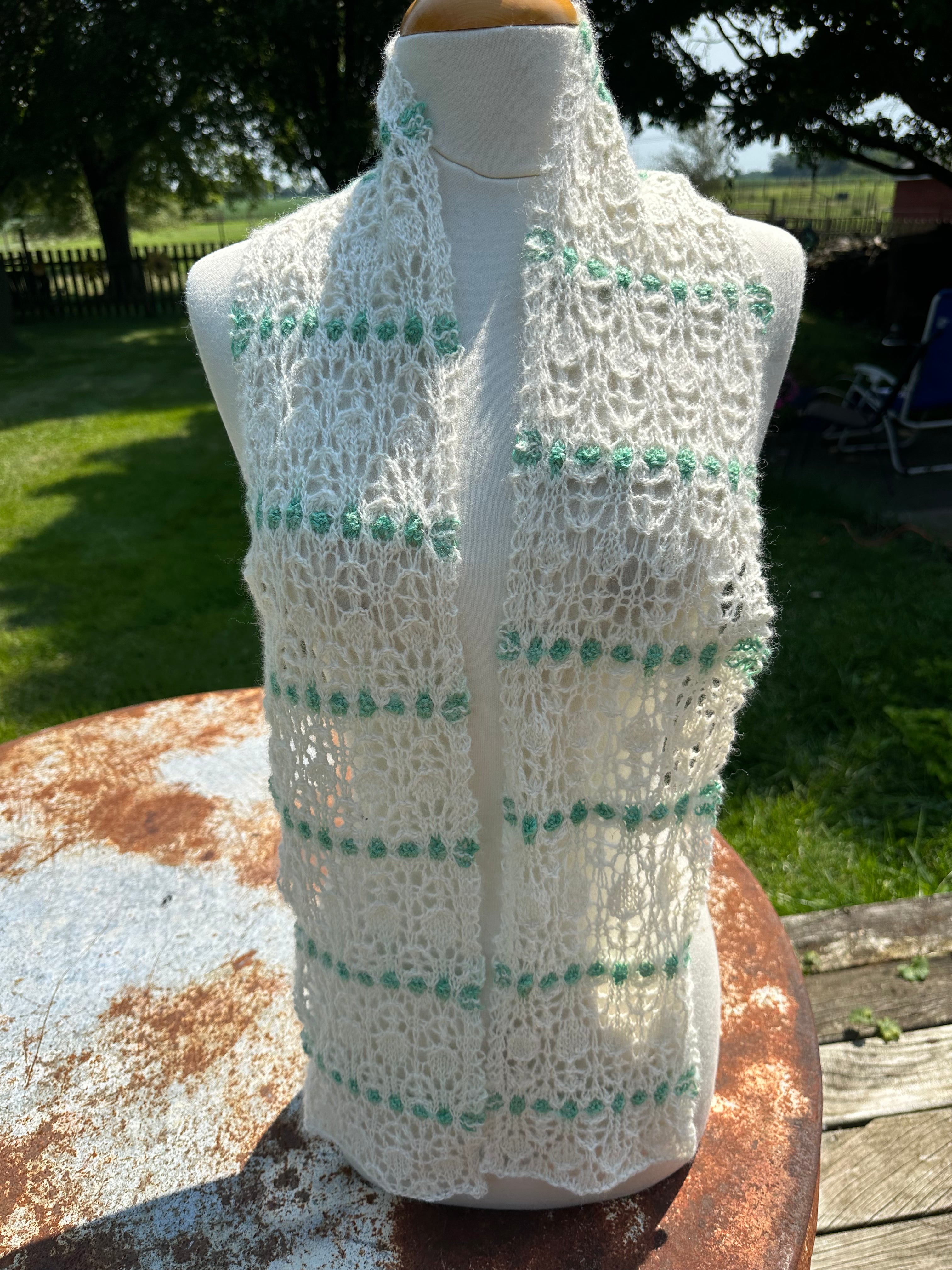 100% USA Alpaca hand knit scarf. Delicate lacey pattern.