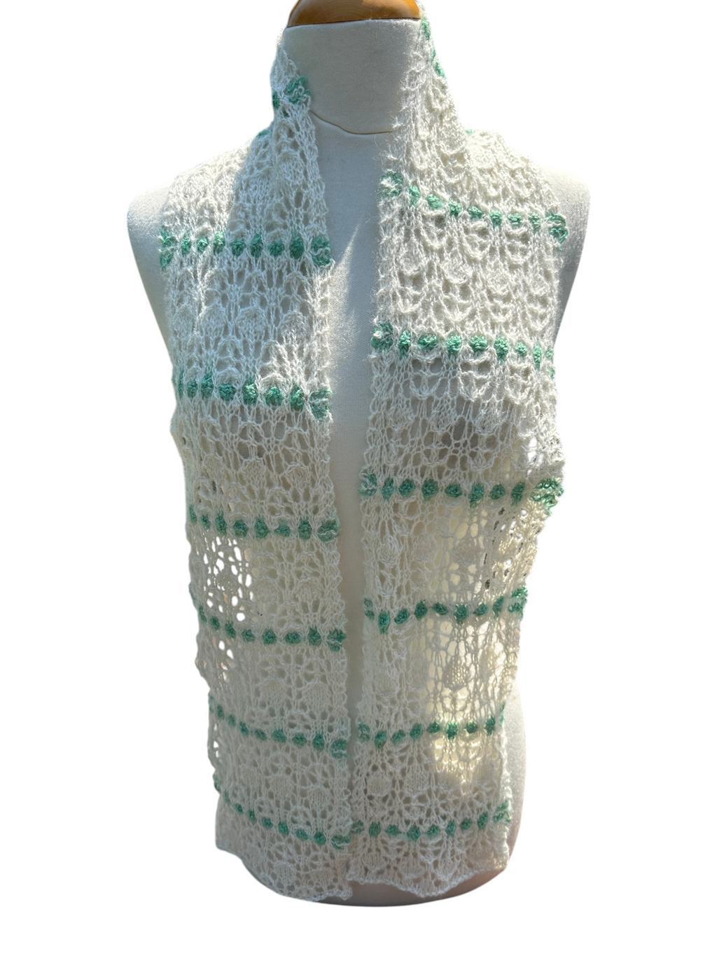 Oak Crest Alpacas and More hand knit white and green lace alpaca scarf on a mannequin