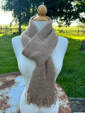 100% USA Alpaca knit scarf. Very soft and warm.