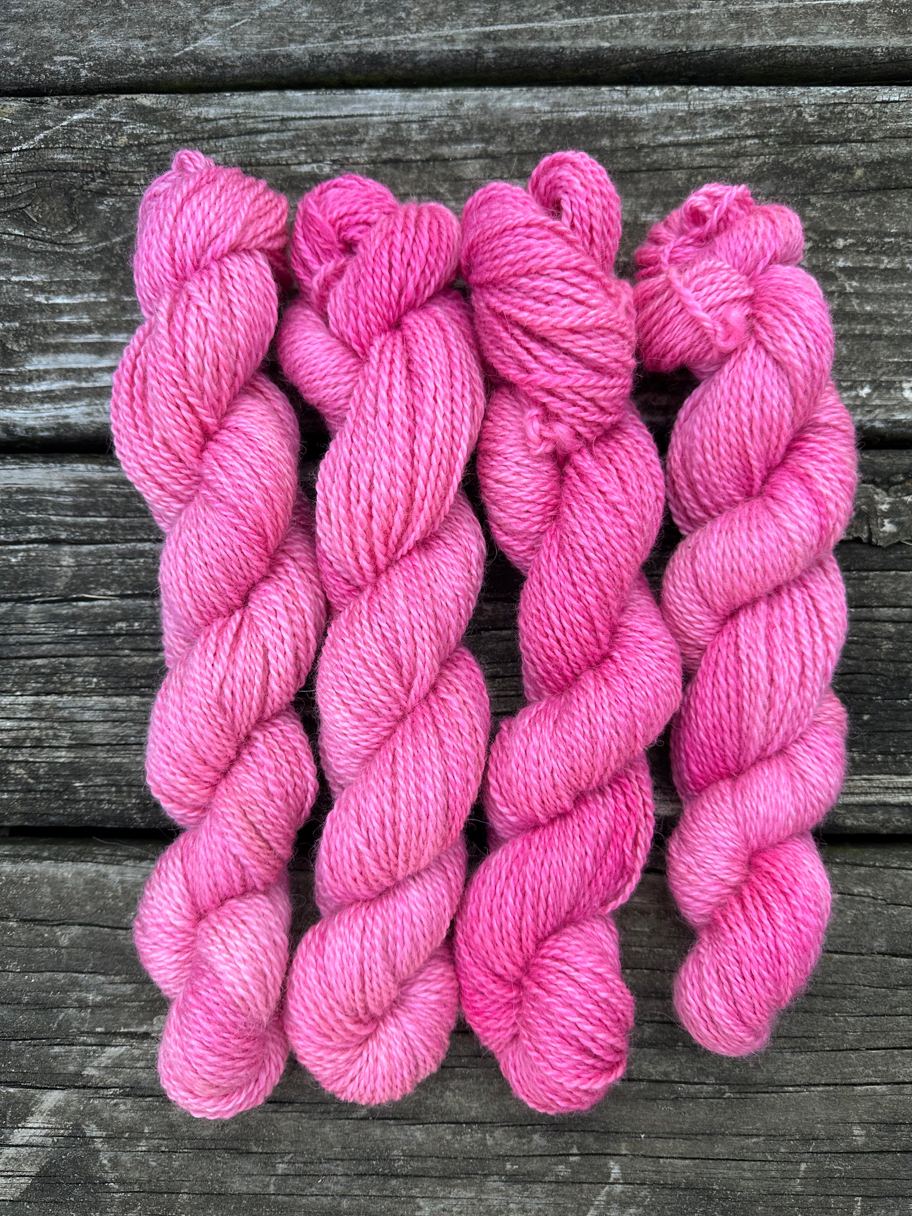 150 yd of Worsted weight 100%  American Alpaca yarn, 2 ply, from our alpacas. Hand dyed.