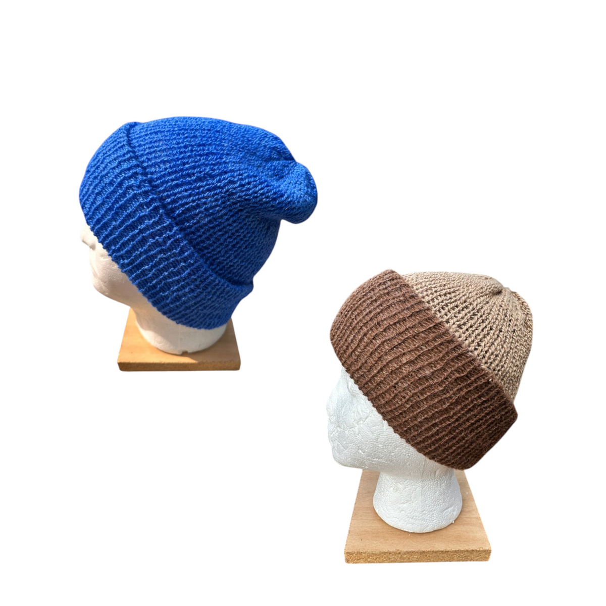 Oak Crest Alpacas and More reversible double knit 100% alpaca hats in royal blue and brown-fawn on mannequin heads.