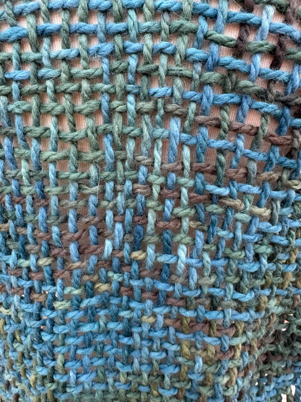 100% Alpaca hand woven shawl with fringe. Very soft and warm.