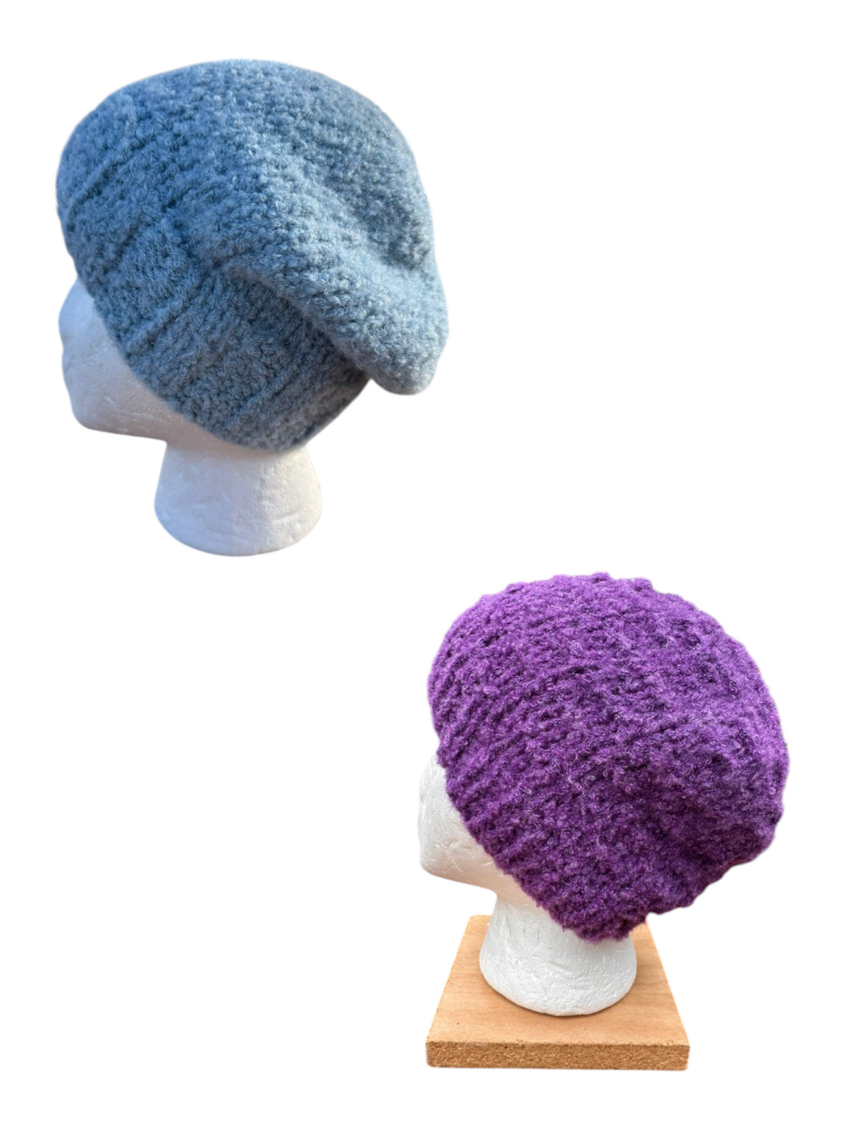 Oak Crest Alpacas and More hand-knit boucle alpaca blend hats in blue and purple on mannequin heads