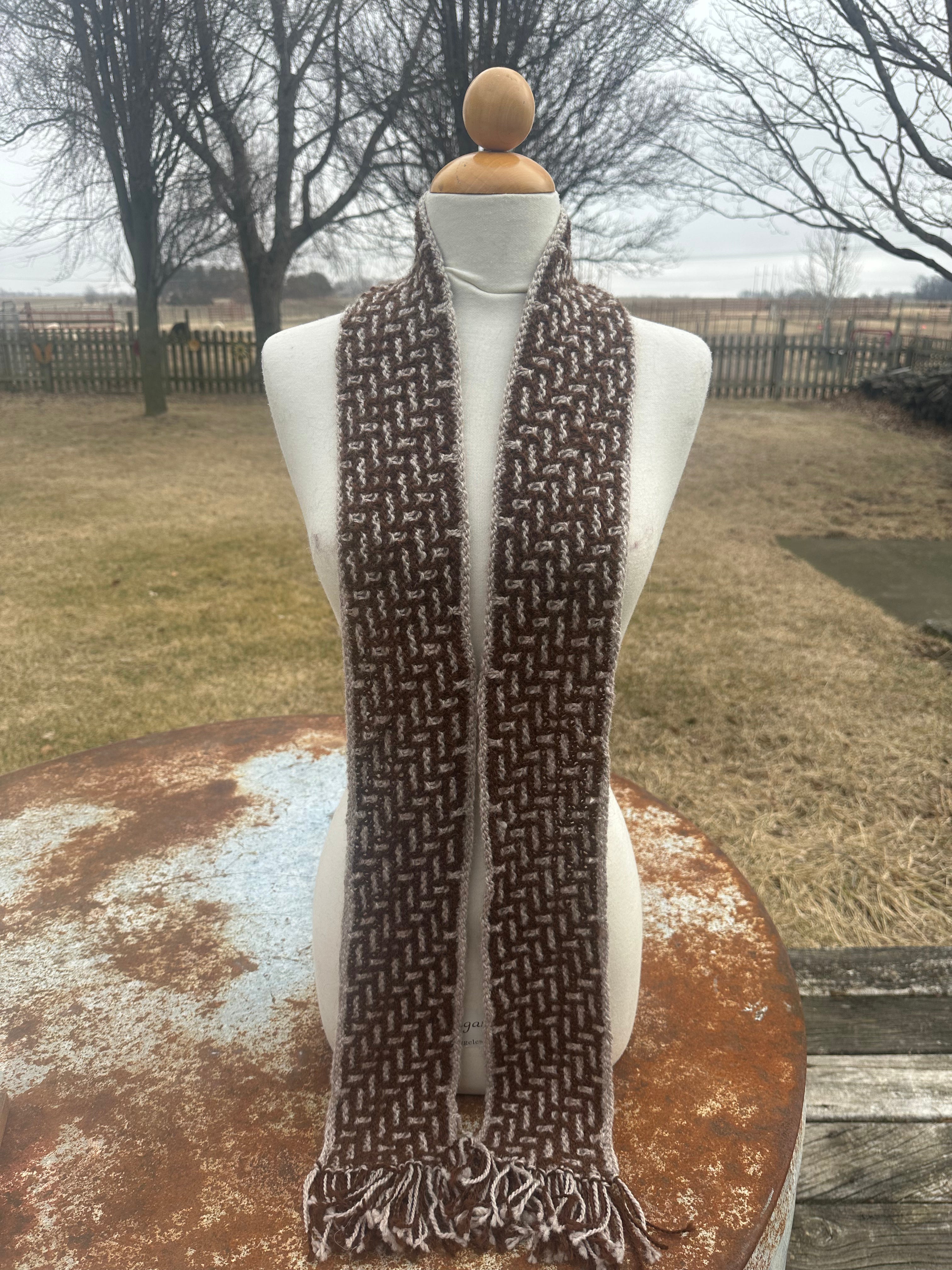 100% USA Alpaca hand knit scarf. Very soft and warm.