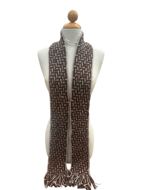 Oak Crest Alpacas and More hand knit brown and white alpaca wool scarf with fringe on a mannequin