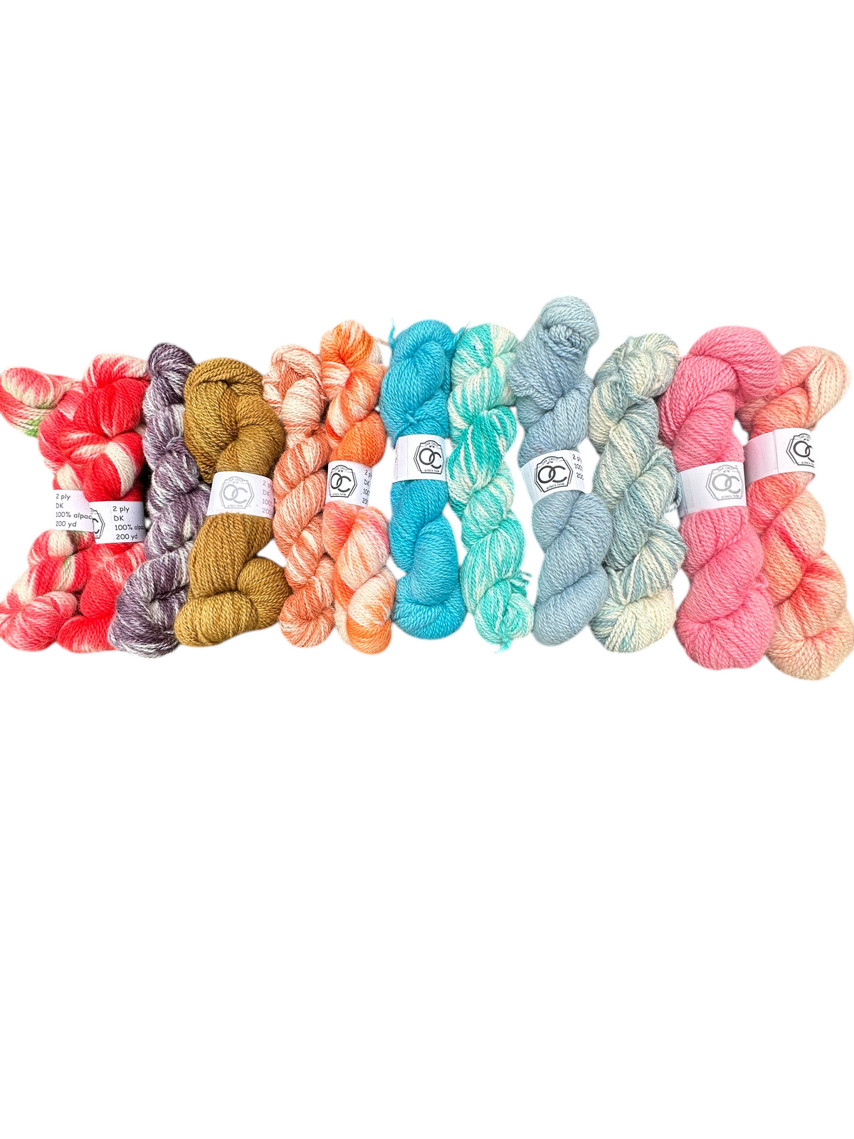Oak Crest Alpacas and More hand-dyed 100% American alpaca DK yarn skeins in a variety of vibrant colors
