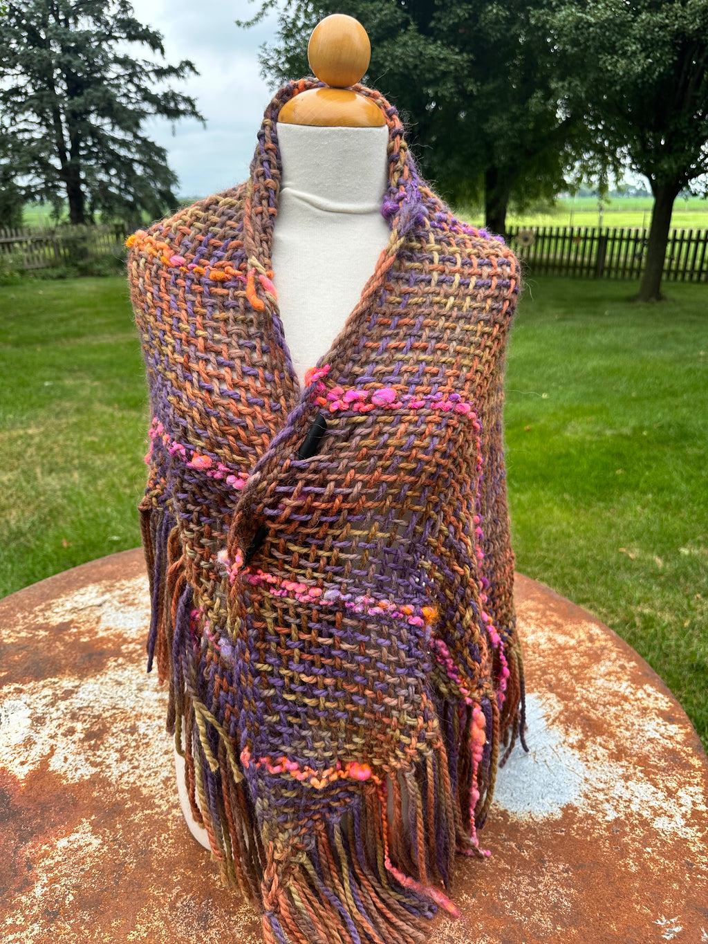 100% Alpaca hand woven shawl with fringe. Very soft and warm.