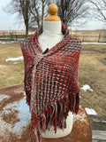100% Alpaca hand woven shawl with fringe. Very soft and warm.