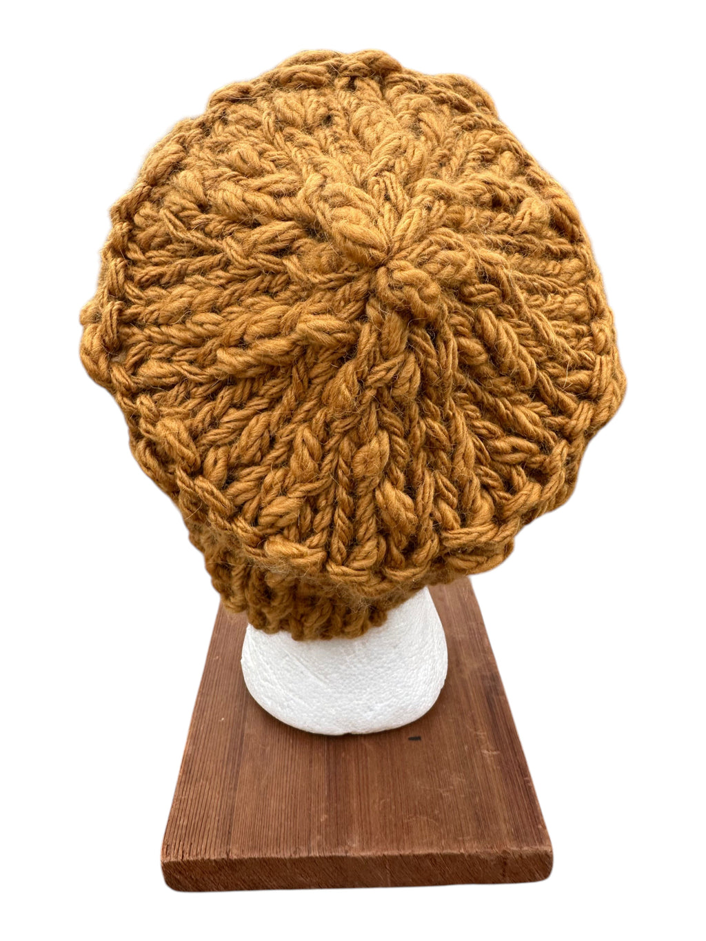 Oak Crest Alpacas and More hand-knit gold chunky alpaca and wool hat with textured yarn on a display stand