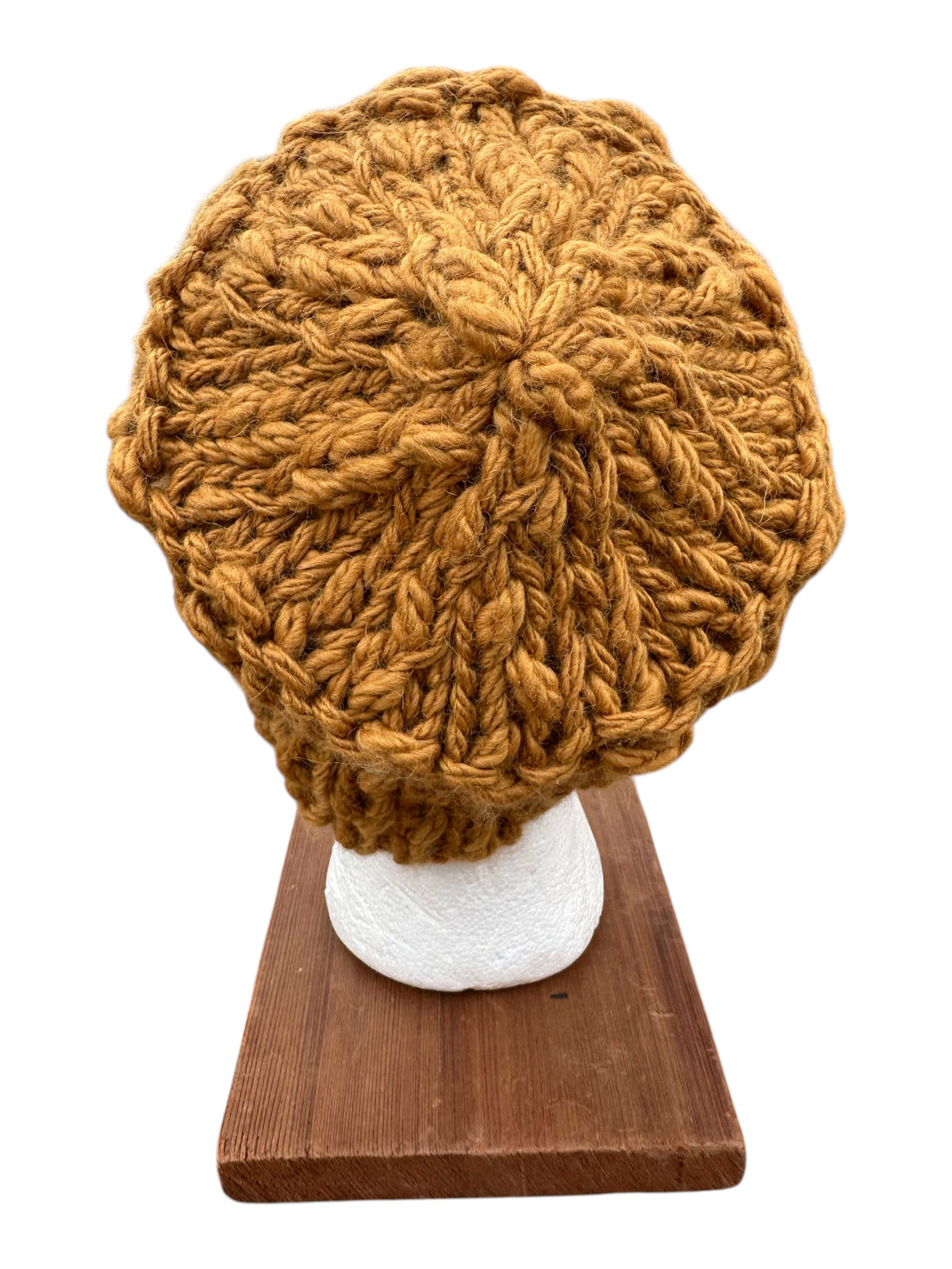 Oak Crest Alpacas and More hand-knit gold chunky alpaca and wool hat with textured yarn on a display stand