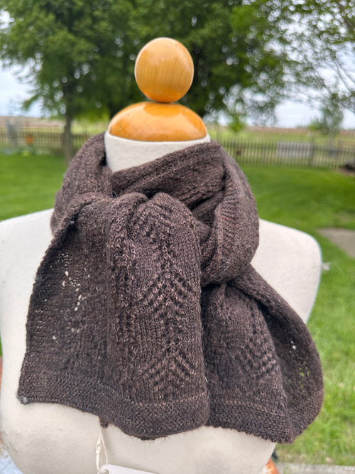 100% USA Alpaca machine knit scarf. Very soft and warm.