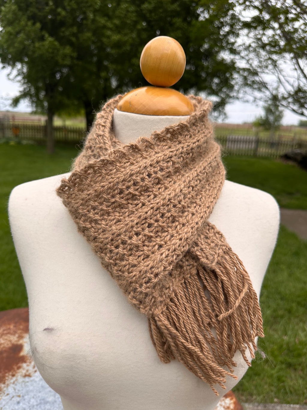 100% USA Alpaca hand knit scarf. Very soft and warm.