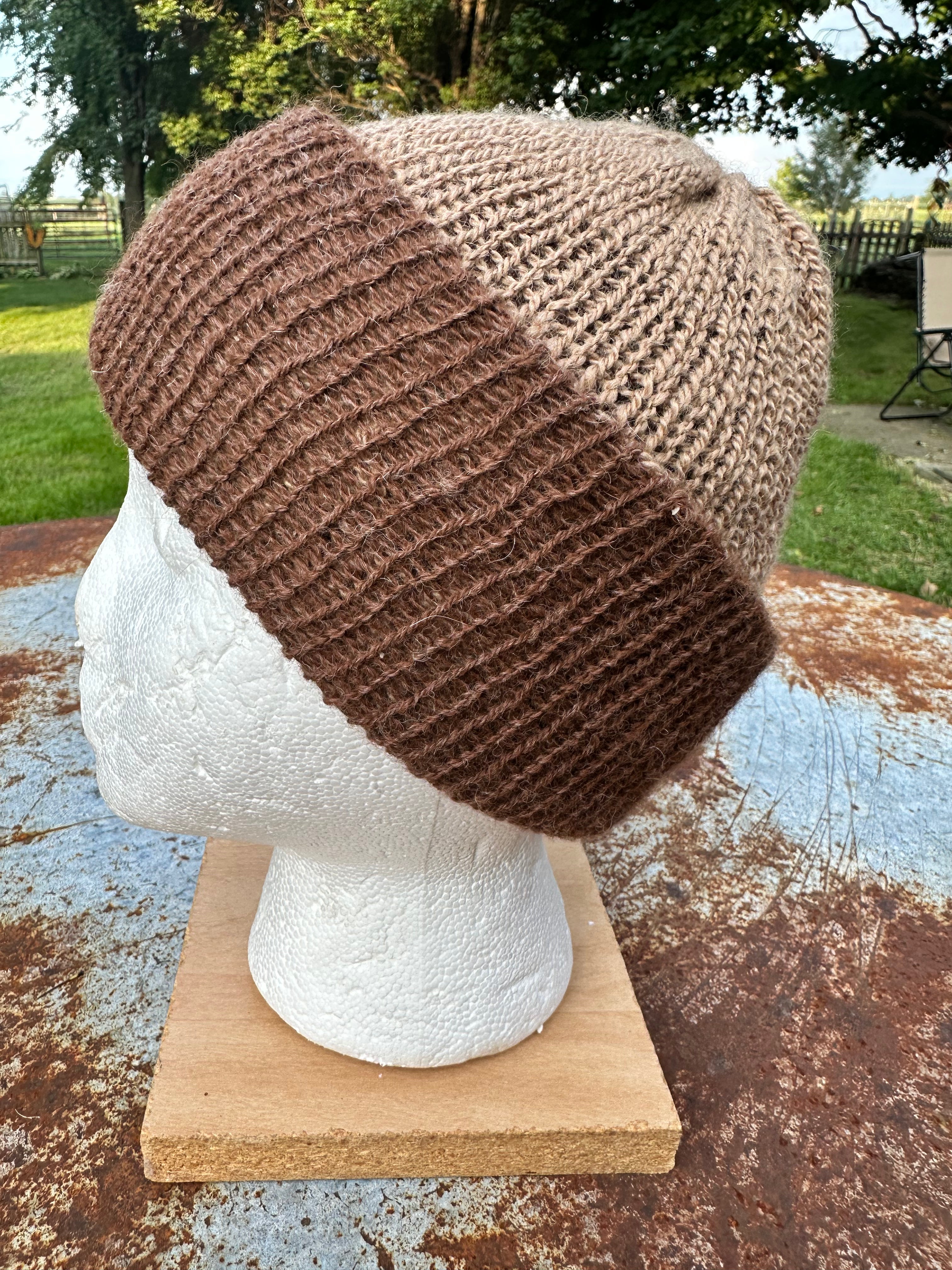 Lightweight double knit Alpaca hat with fold over brim. Reversible.