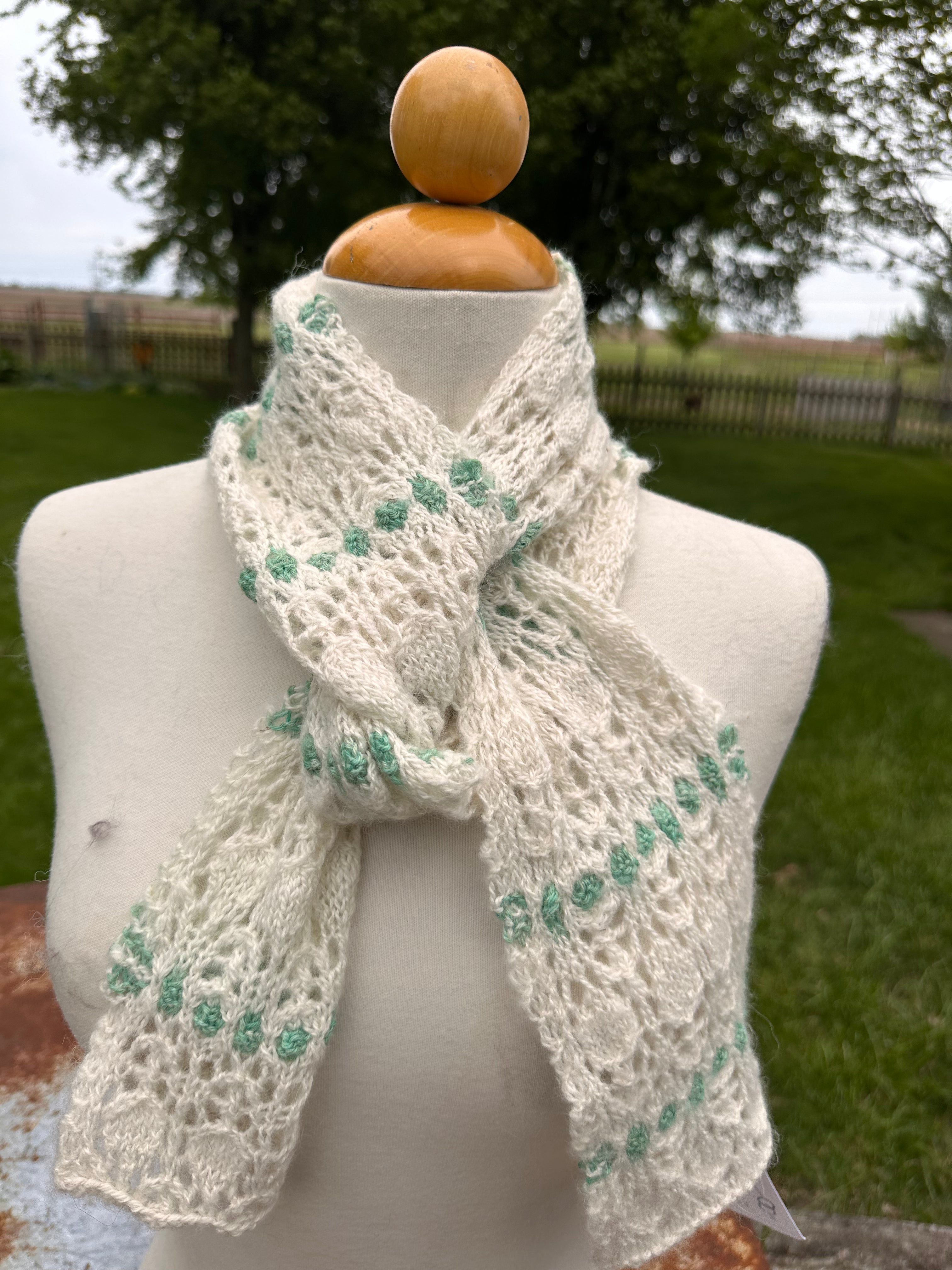 100% USA Alpaca hand knit scarf. Delicate lacey pattern.