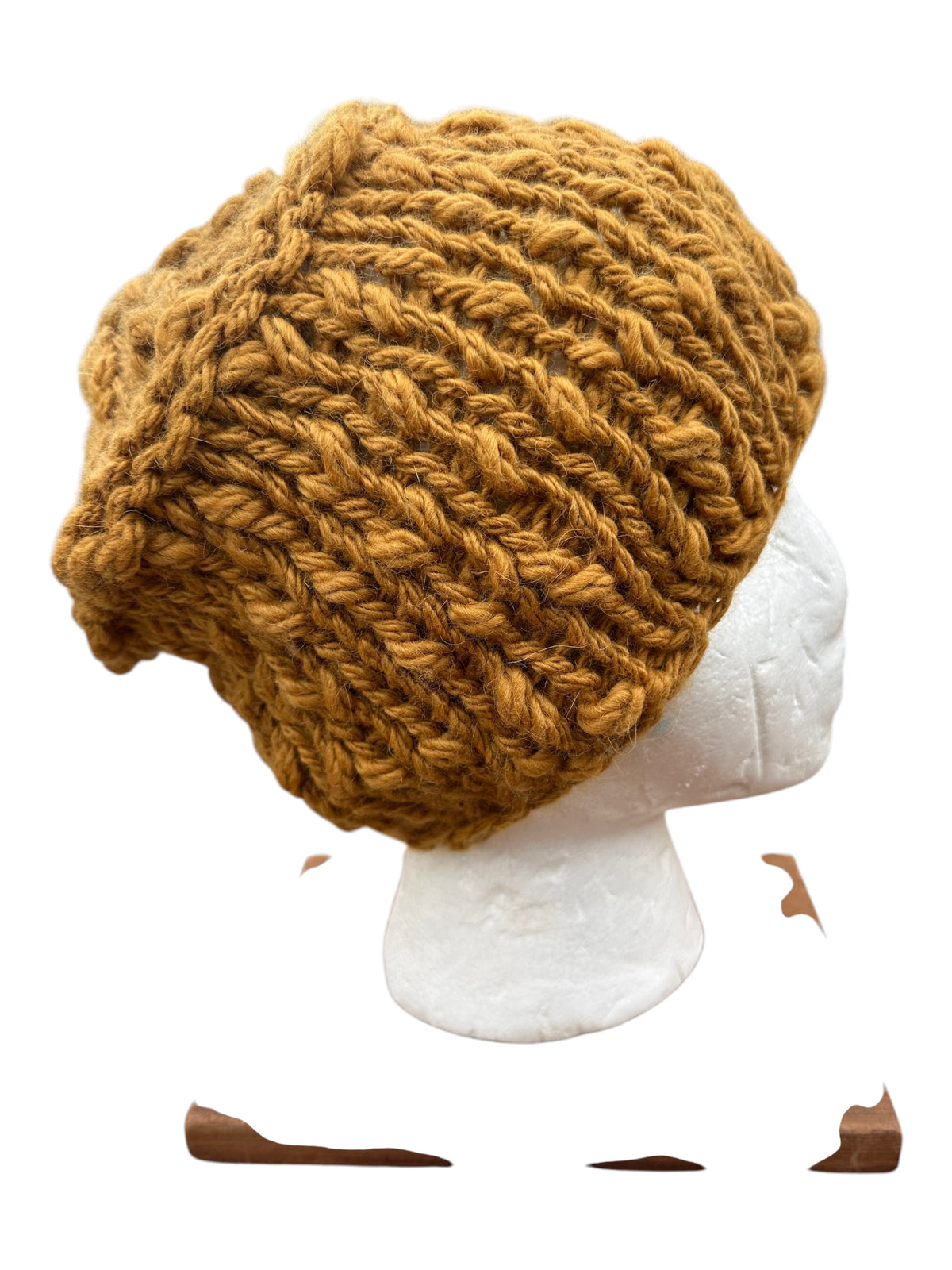 Oak Crest Alpacas and More hand-knit gold chunky alpaca and wool beanie with textured yarn on a mannequin head