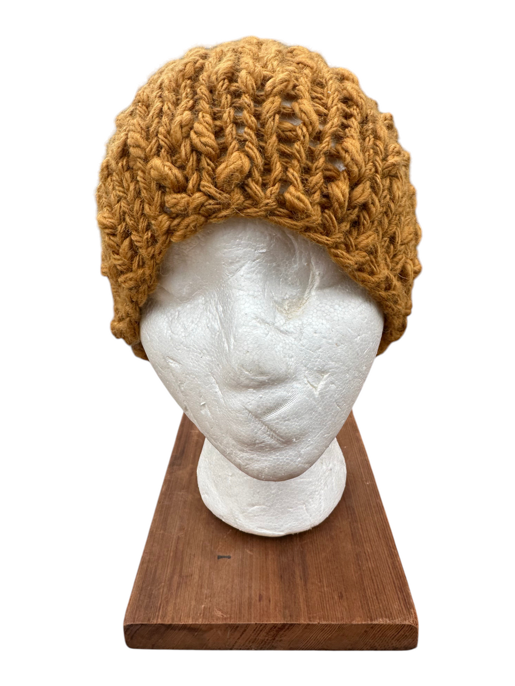 Oak Crest Alpacas and More hand-knit gold chunky alpaca and wool beanie with thick textured yarn on a display head