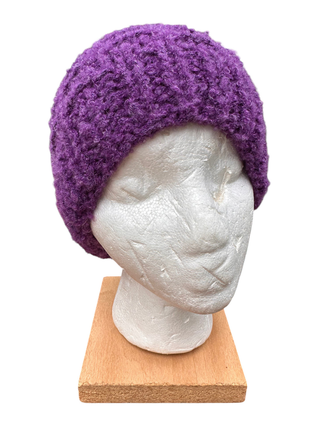 Oak Crest Alpacas and More hand-knit purple boucle alpaca blend hat on a white mannequin head