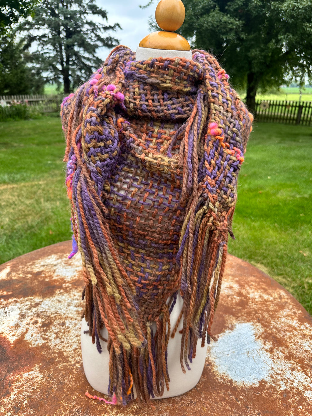 100% Alpaca hand woven shawl with fringe. Very soft and warm.
