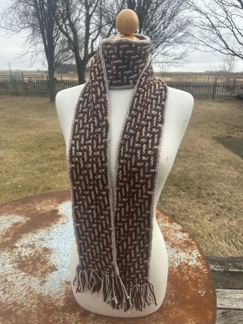100% USA Alpaca hand knit scarf. Very soft and warm.