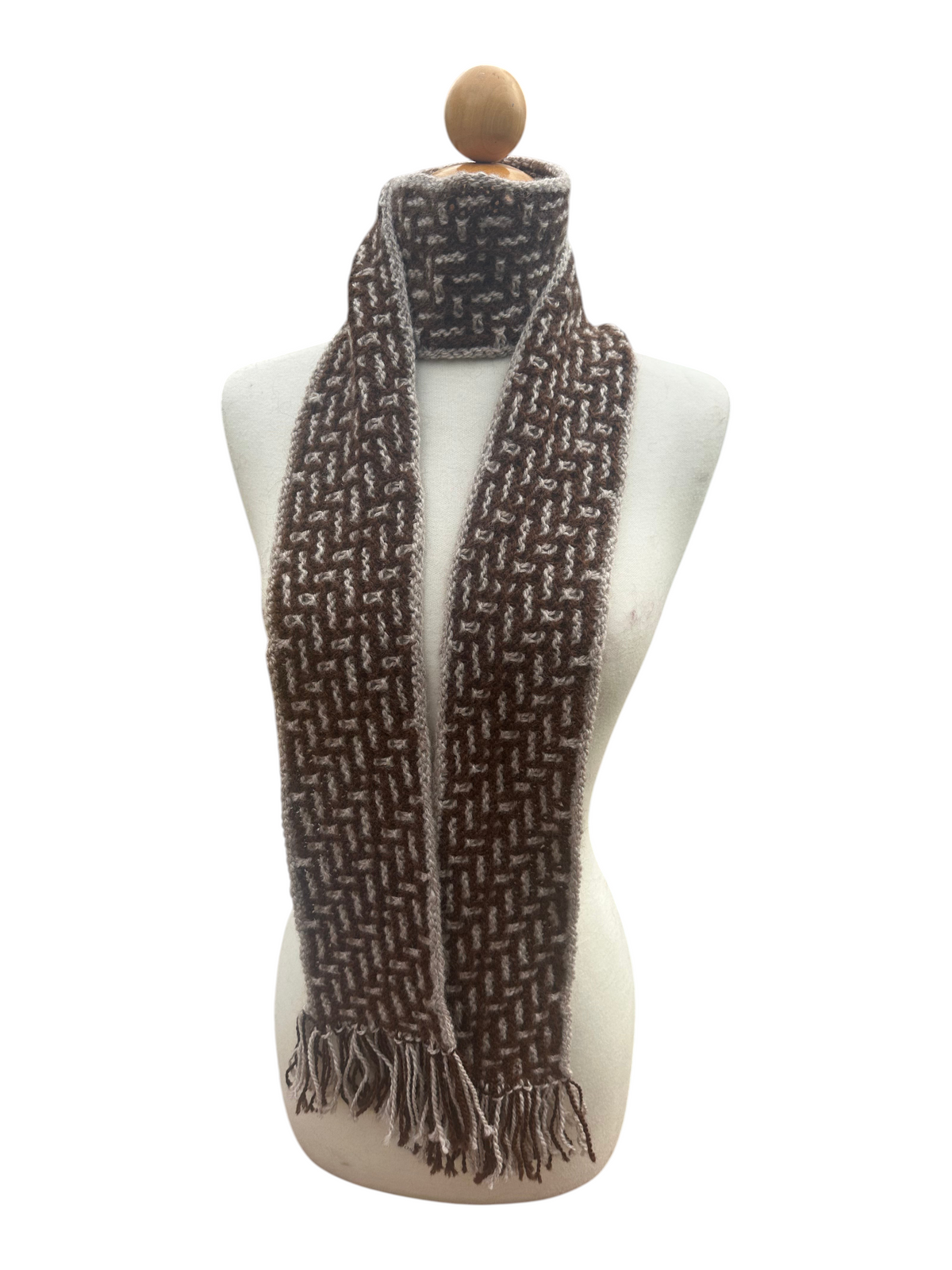 Oak Crest Alpacas and More hand knit brown and cream alpaca wool scarf with fringe on a mannequin