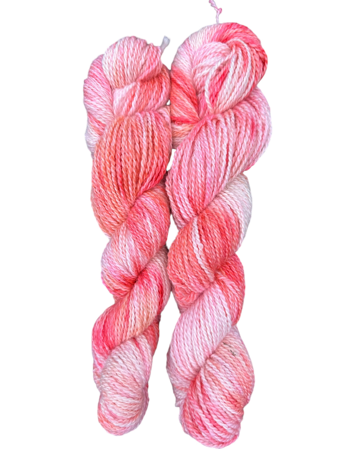 Oak Crest Alpacas and More hand dyed 100% American alpaca DK yarn in variegated pink and white 2-ply skeins