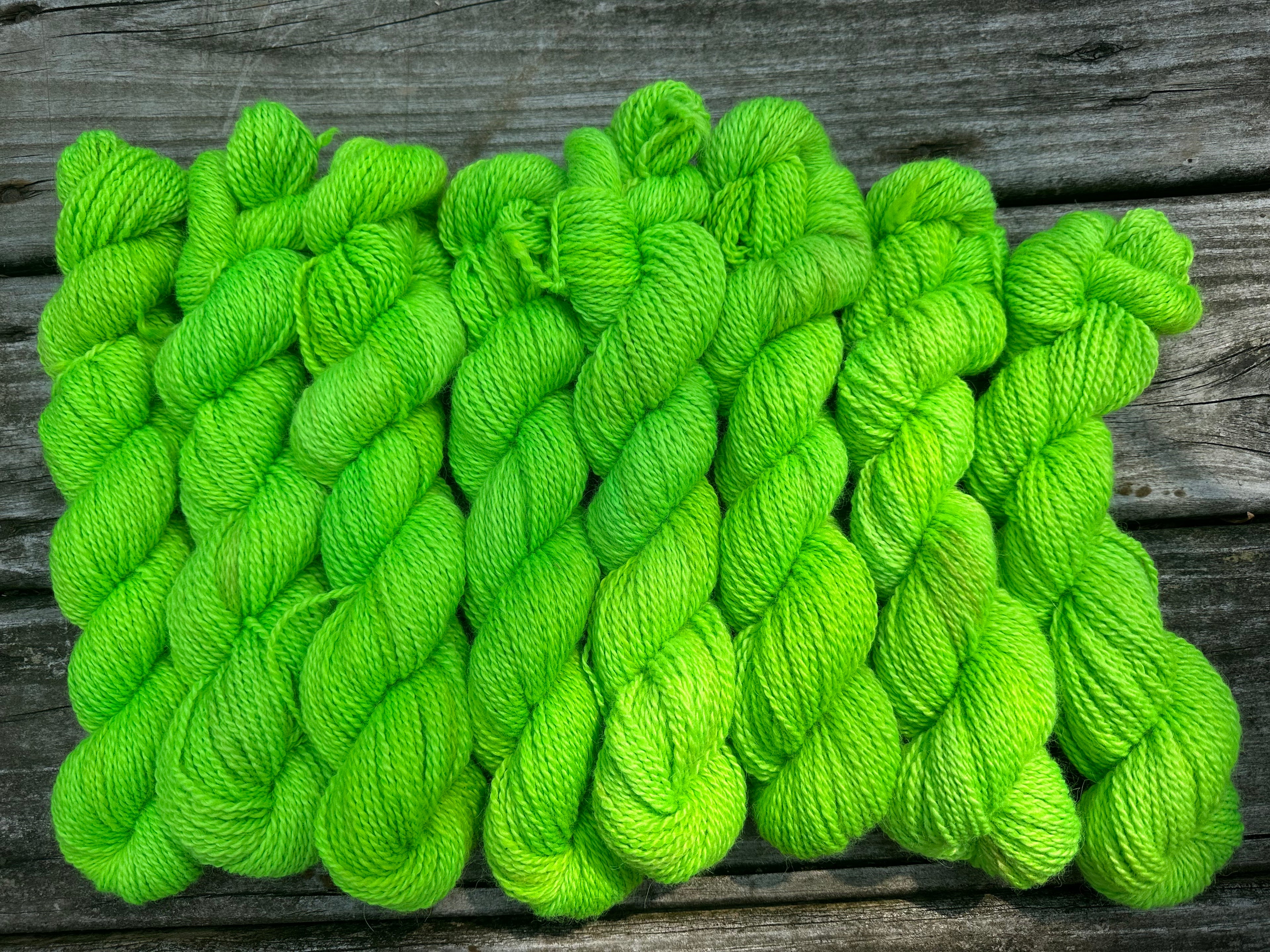 150 yd of Worsted weight 100%  American Alpaca yarn, 2 ply, from our alpacas. Hand dyed.