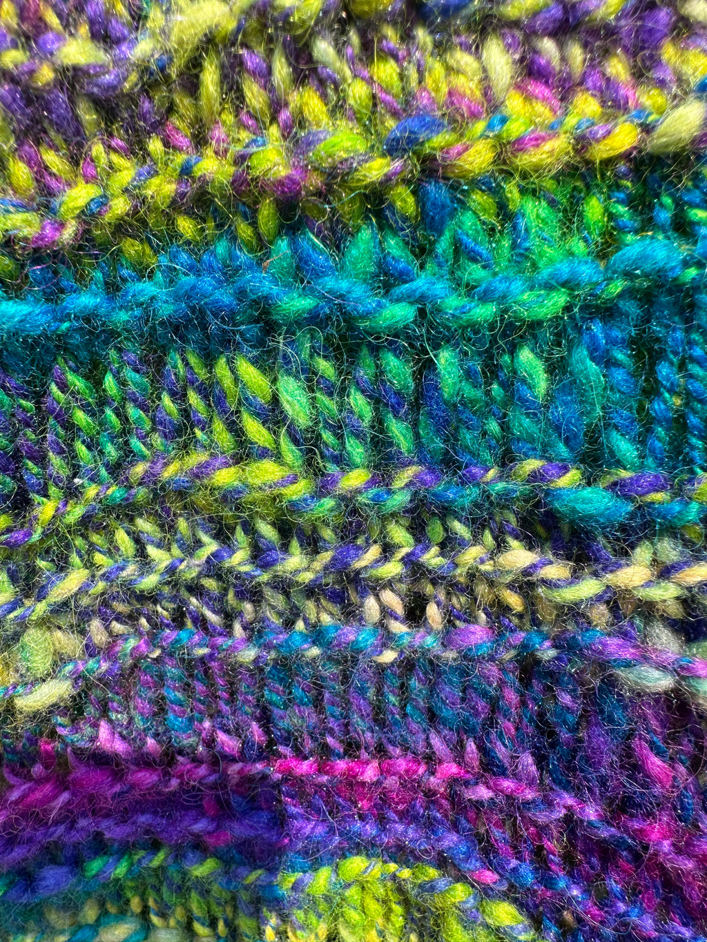 100% USA Alpaca Chunky.  Hand spun hand knit scarf. Very soft and warm.