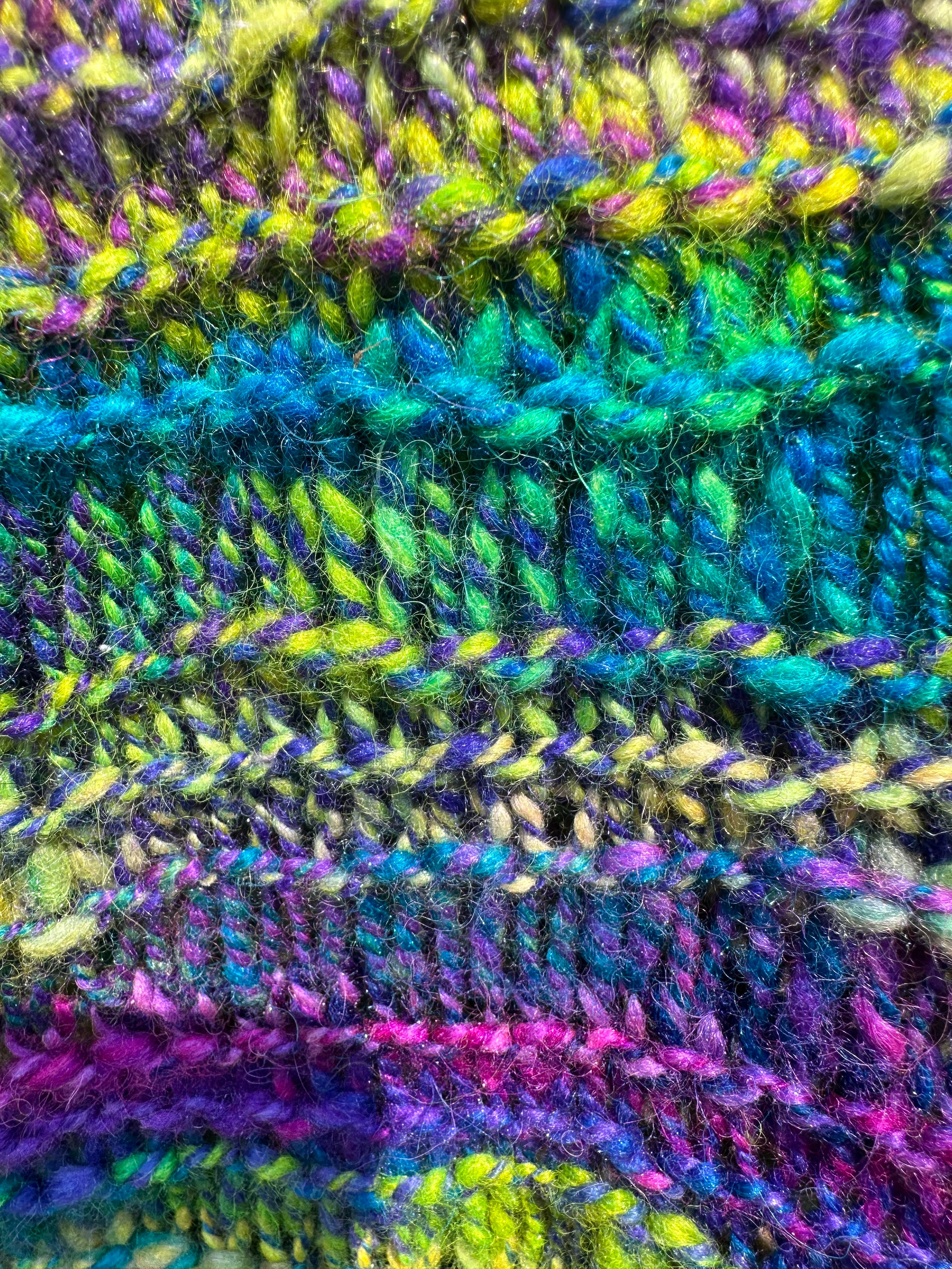 100% USA Alpaca Chunky.  Hand spun hand knit scarf. Very soft and warm.