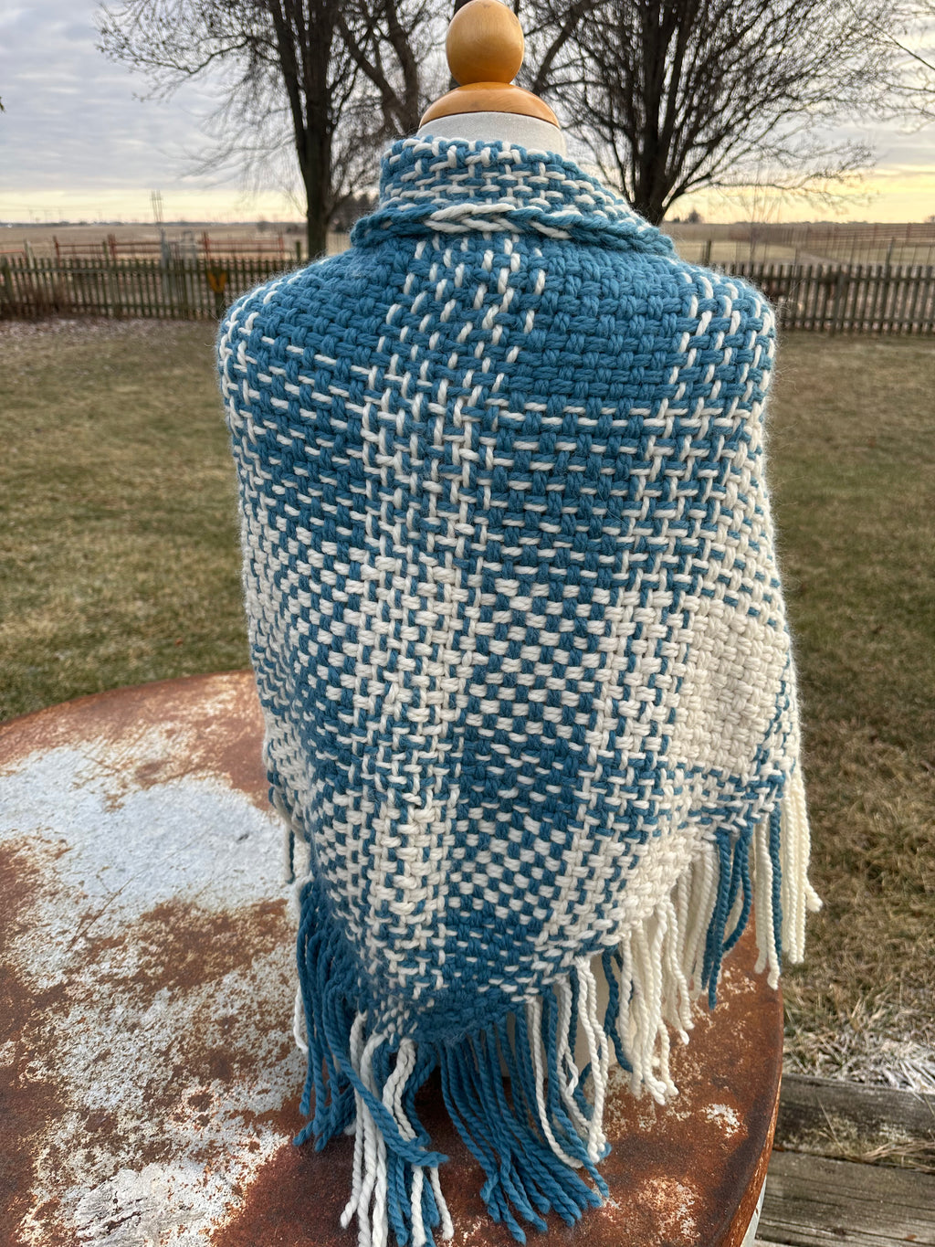 100% Alpaca hand woven shawl with fringe. Very soft and warm.