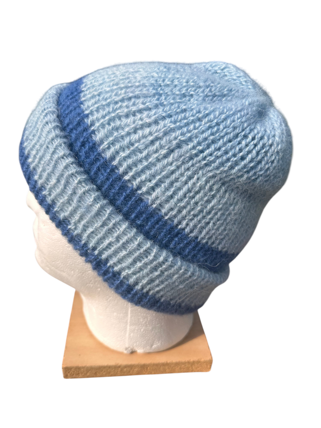 Oak Crest Alpacas and More reversible double knit alpaca hat in light blue with a dark blue stripe and fold over brim