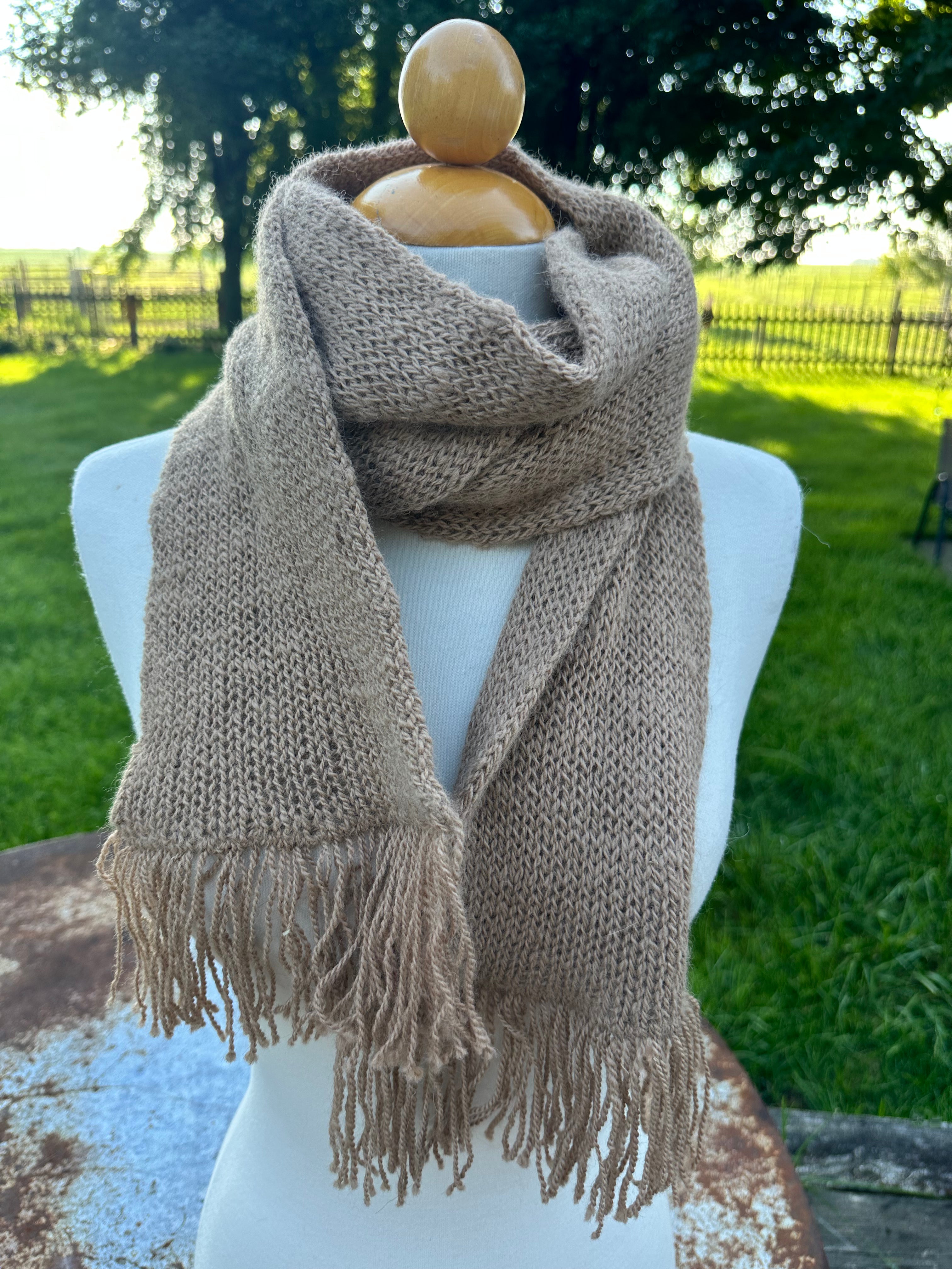100% USA Alpaca knit scarf. Very soft and warm.