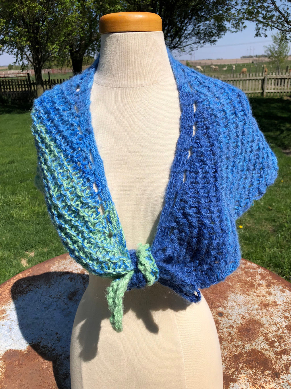 Alpaca hand knit  shawl. Very soft and warm.