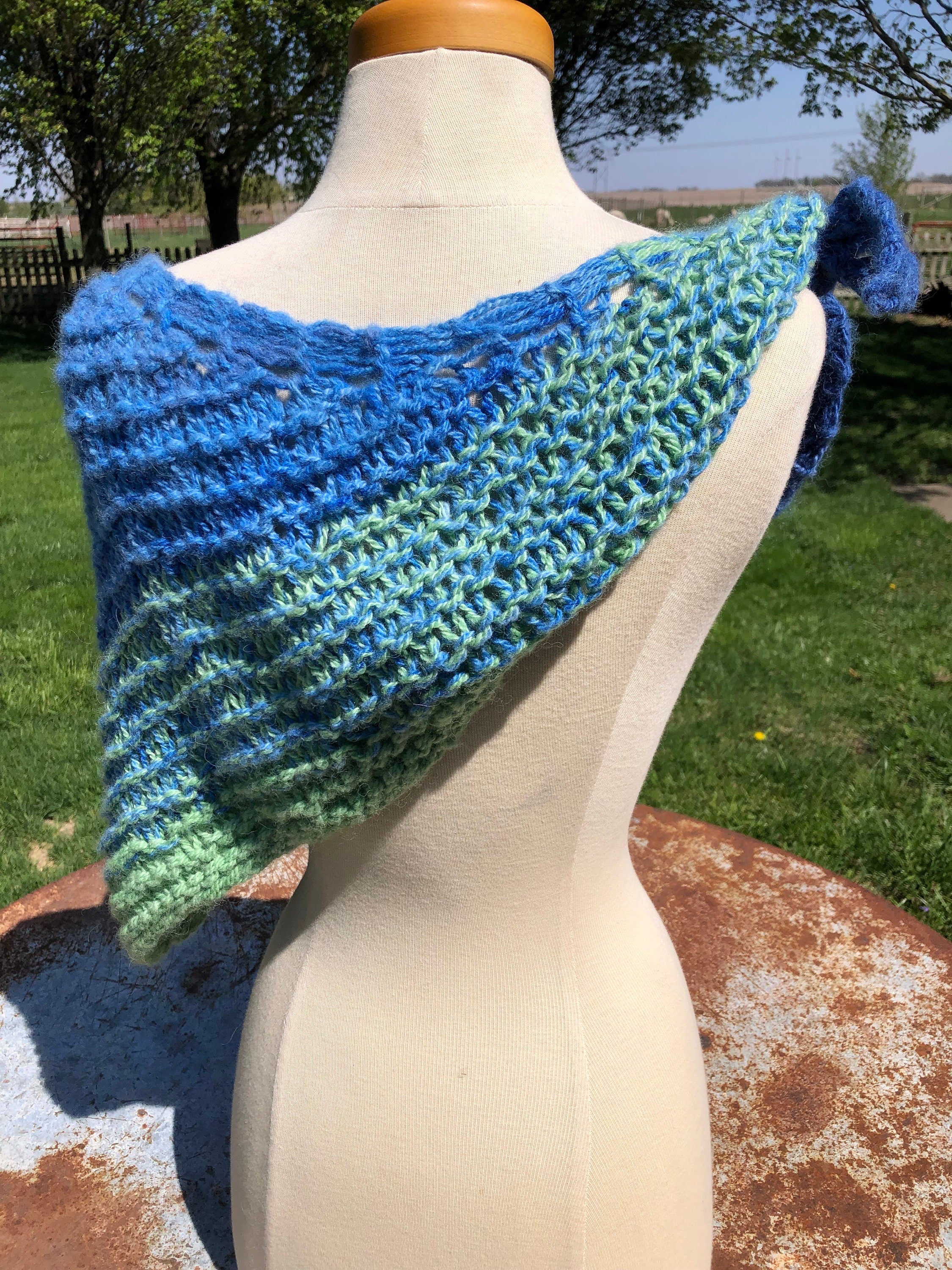 Alpaca hand knit  shawl. Very soft and warm.