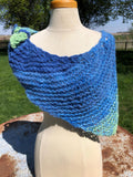 Alpaca hand knit  shawl. Very soft and warm.