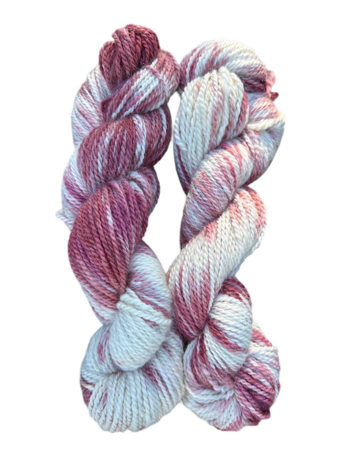 Oak Crest Alpacas and More hand-dyed variegated worsted alpaca yarn skeins in cream and deep pink