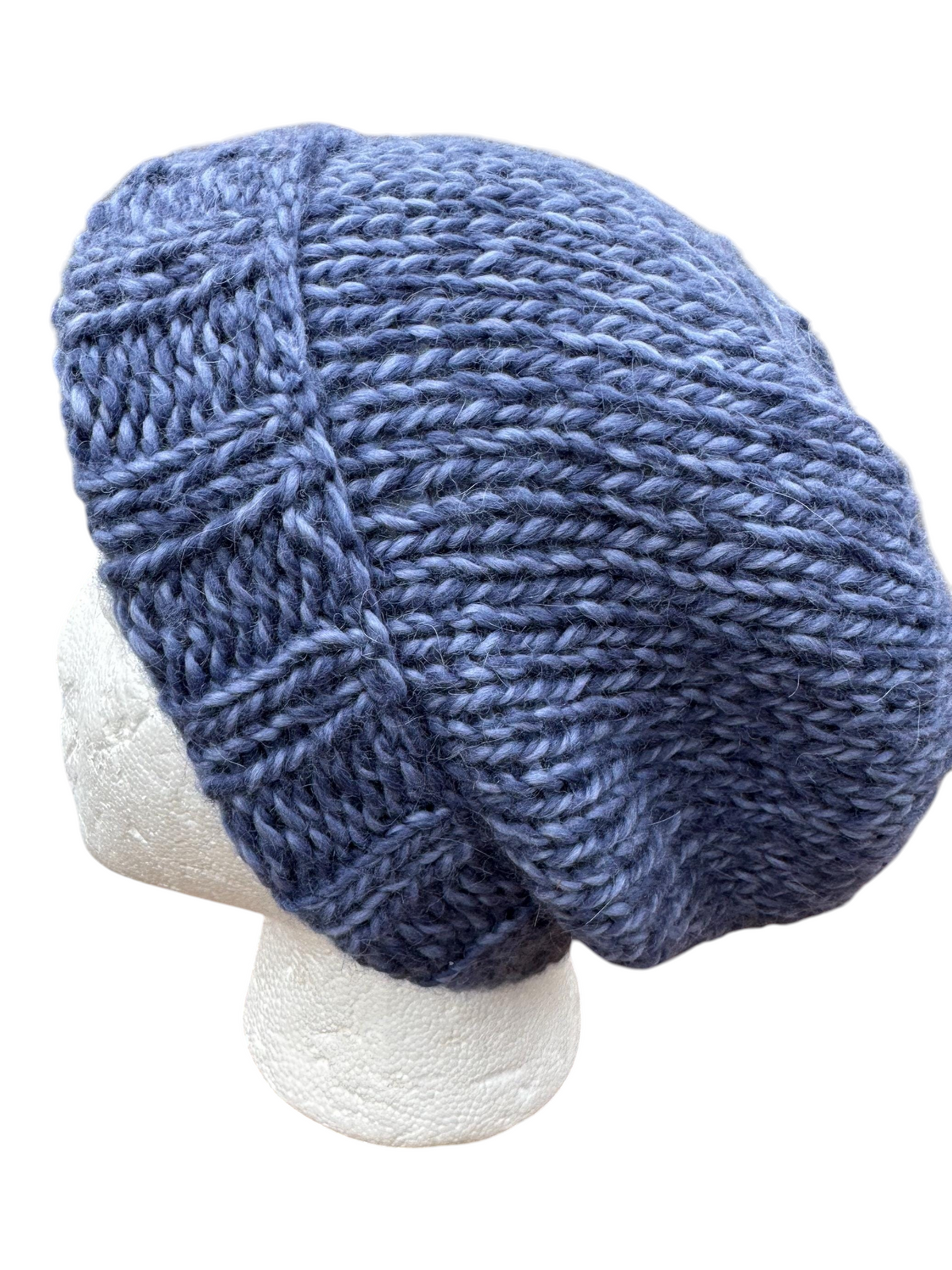 Oak Crest Alpacas and More hand-knit blue chunky alpaca wool slouchy beanie hat on a mannequin head
