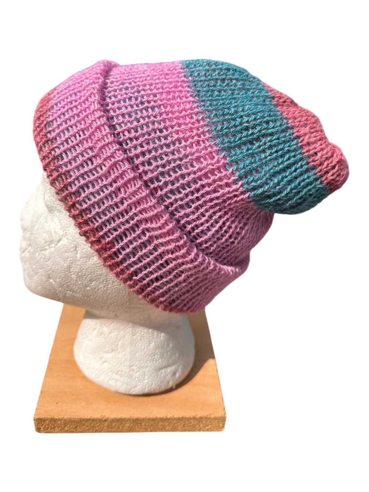 Oak Crest Alpacas and More lightweight double knit alpaca hat in pink and teal with a fold over brim