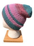 Oak Crest Alpacas and More lightweight double knit alpaca hat in pink and teal stripes on a mannequin head