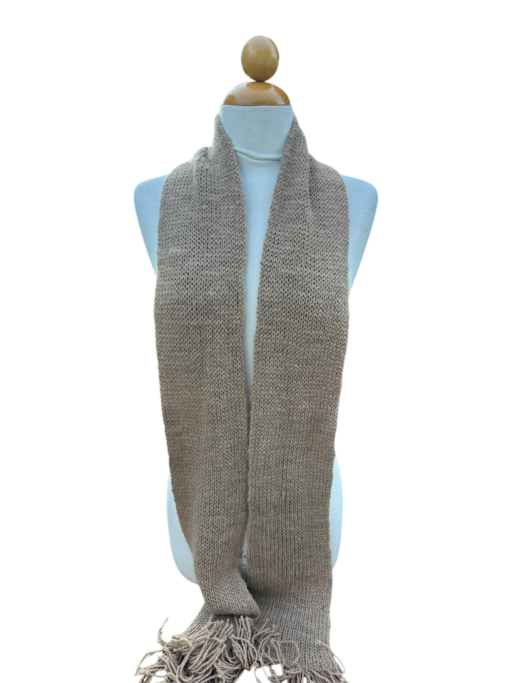 Oak Crest Alpacas and More soft beige double knit alpaca wool scarf with fringe on a mannequin