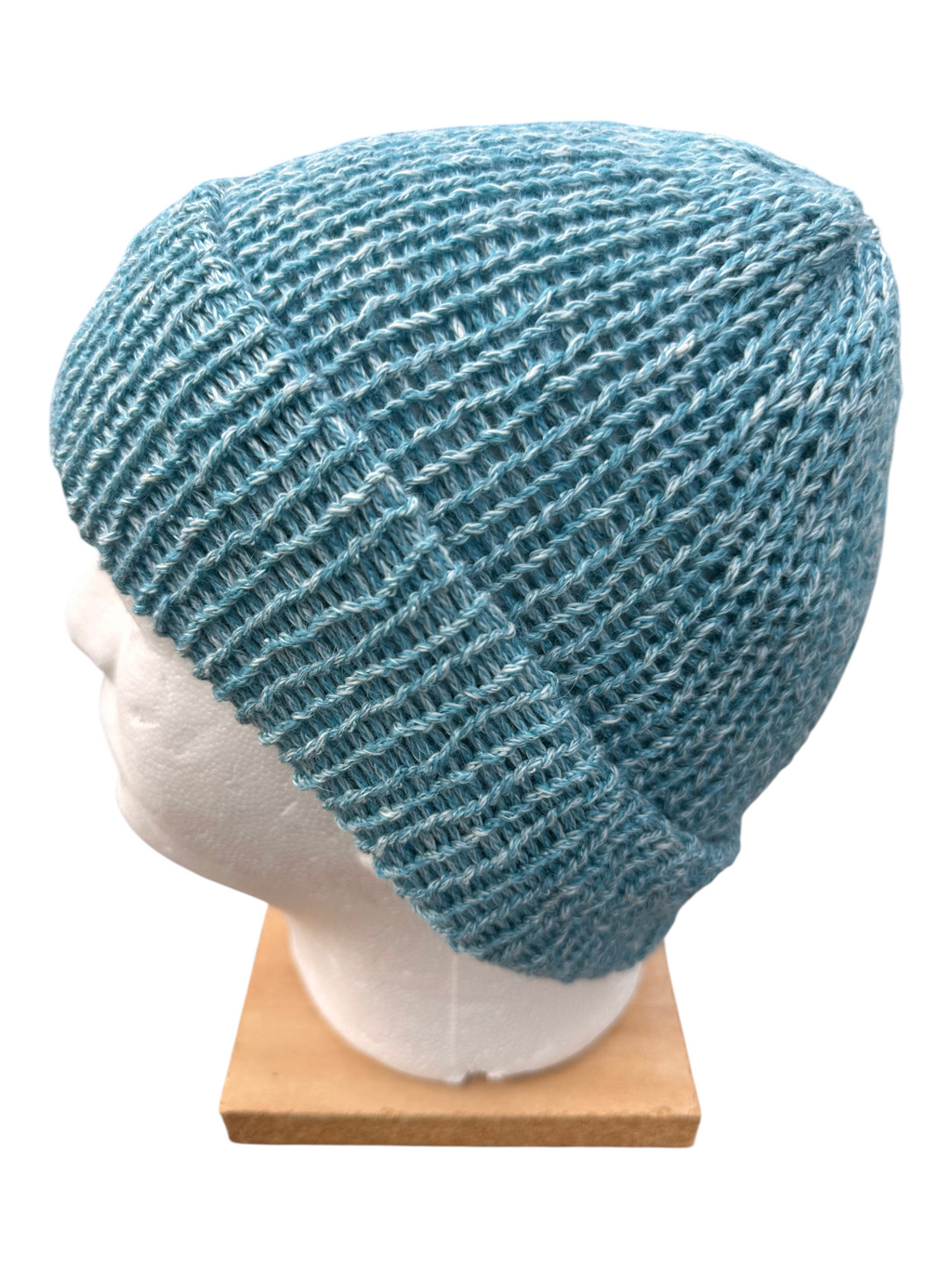 Oak Crest Alpacas and More lightweight blue double knit alpaca and cotton beanie with a fold over brim on mannequin