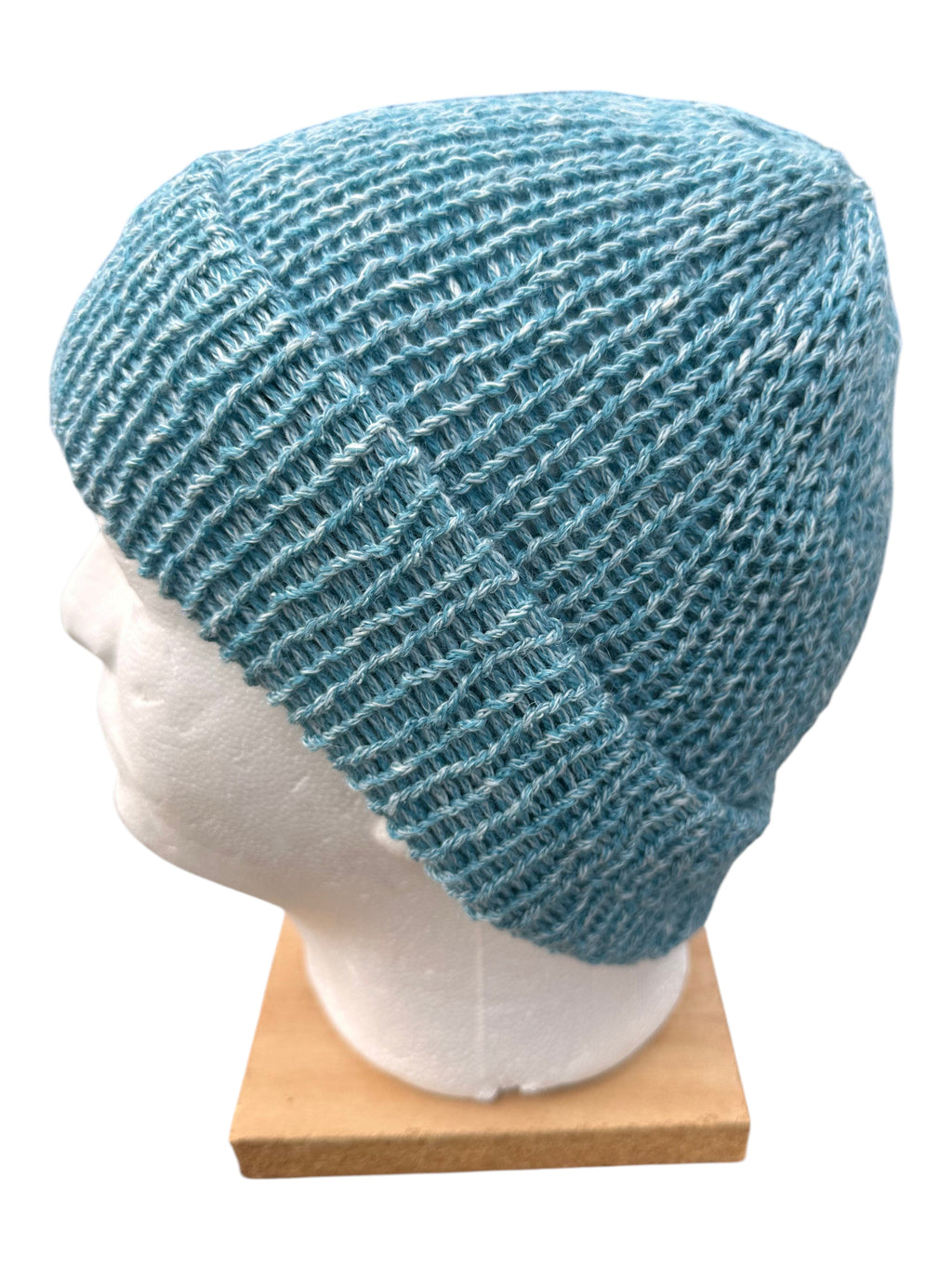 Oak Crest Alpacas and More lightweight blue double knit alpaca and cotton beanie with a fold over brim on a mannequin.