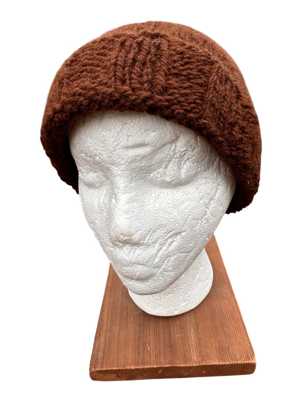 Oak Crest Alpacas and More brown hand-knit chunky 100% alpaca wool beanie with a fold-over brim on a mannequin head.