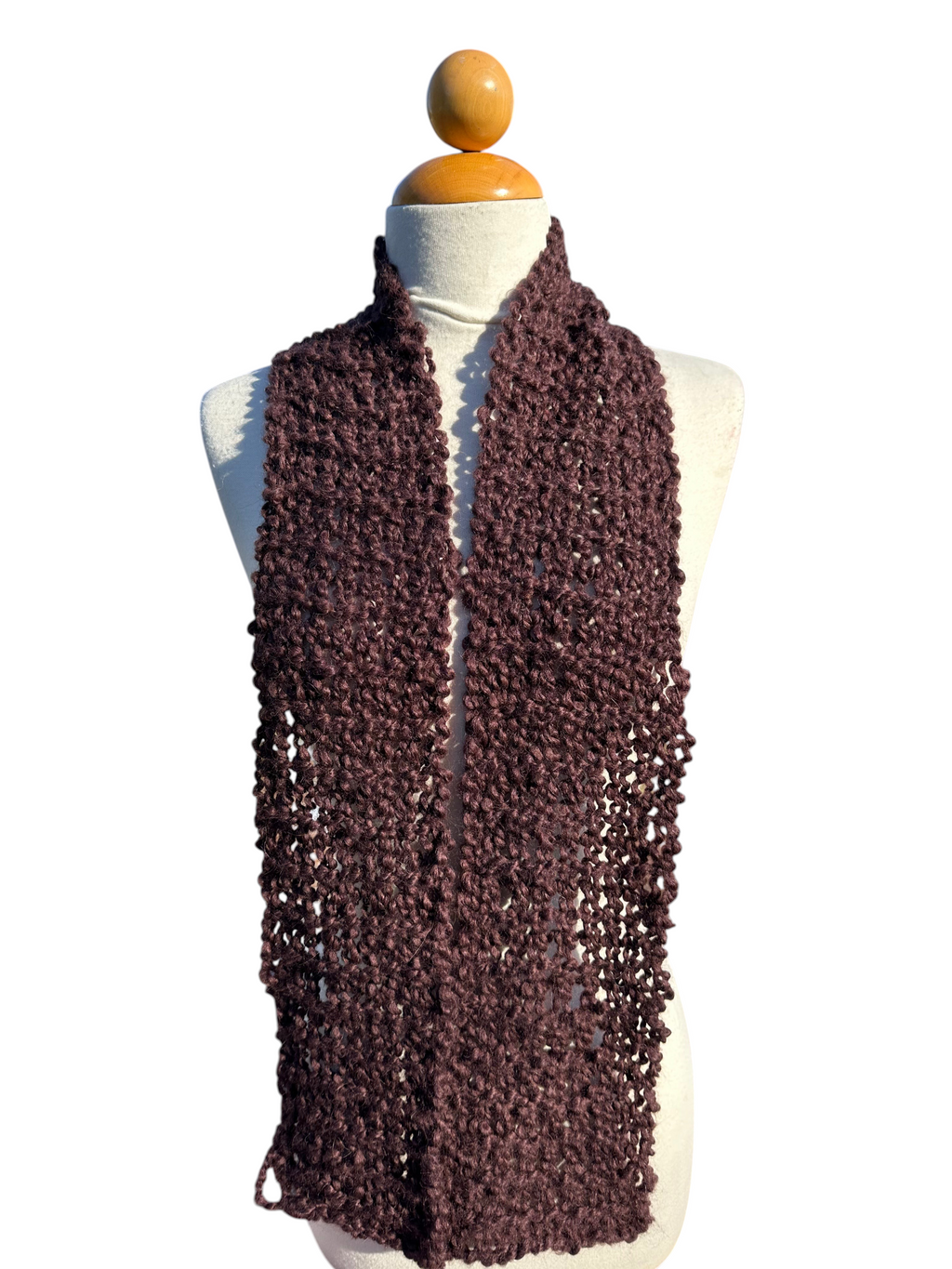 Oak Crest Alpacas and More chocolate brown hand-knit boucle alpaca and wool scarf on a mannequin