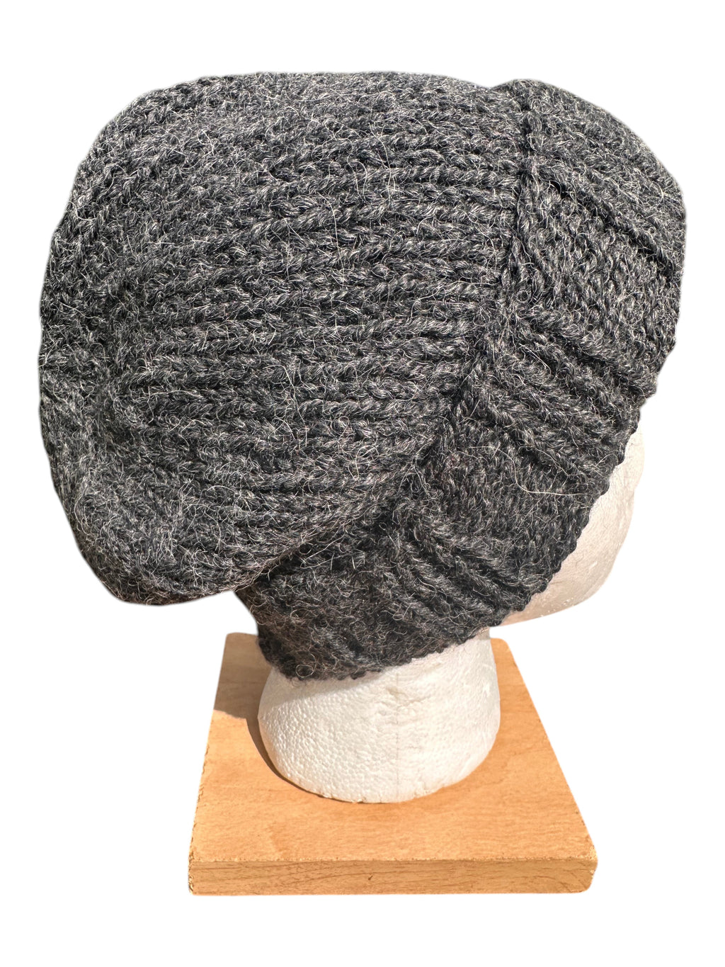 Oak Crest Alpacas and More charcoal gray hand-knit chunky alpaca and wool slouchy winter beanie on a display head