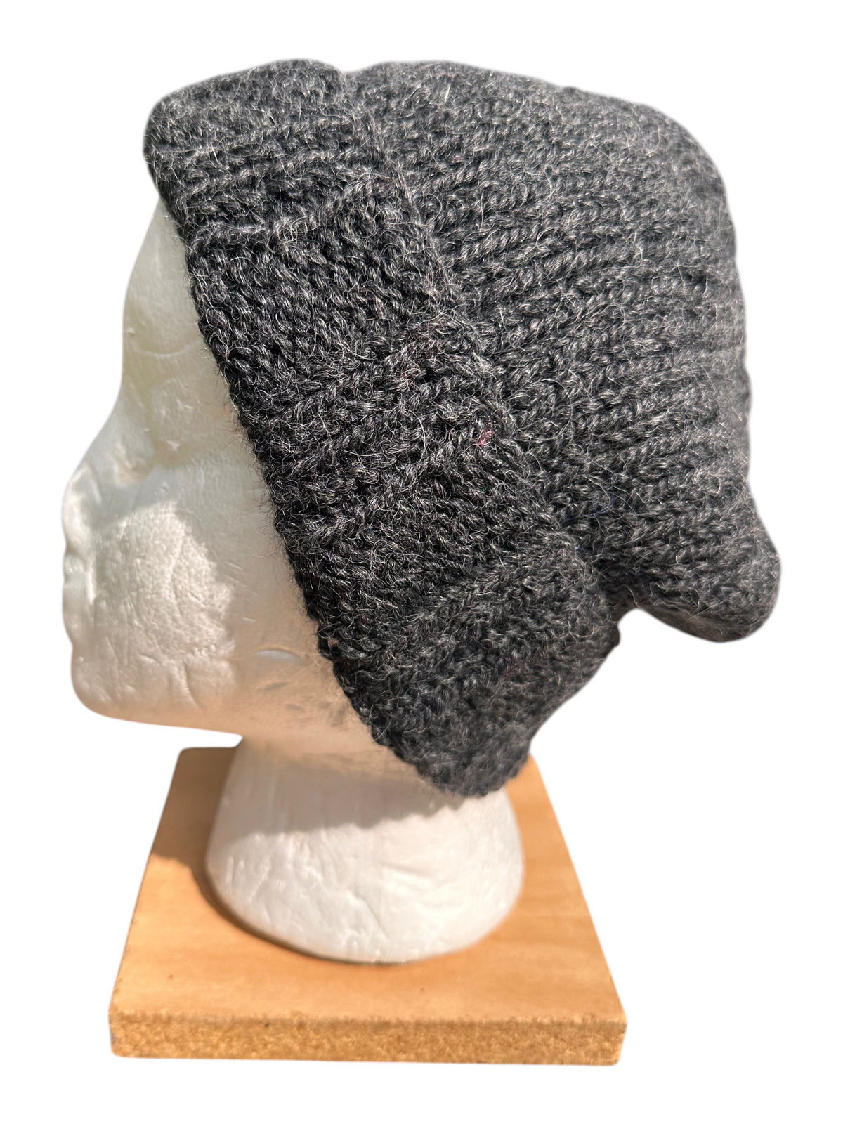 Oak Crest Alpacas and More charcoal gray hand-knit chunky alpaca and wool beanie on a mannequin head