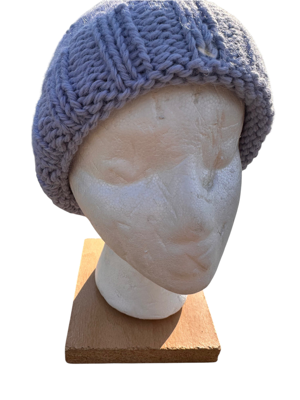 Oak Crest Alpacas and More hand-knit chunky alpaca and wool beanie in light blue, styled with a folded brim.