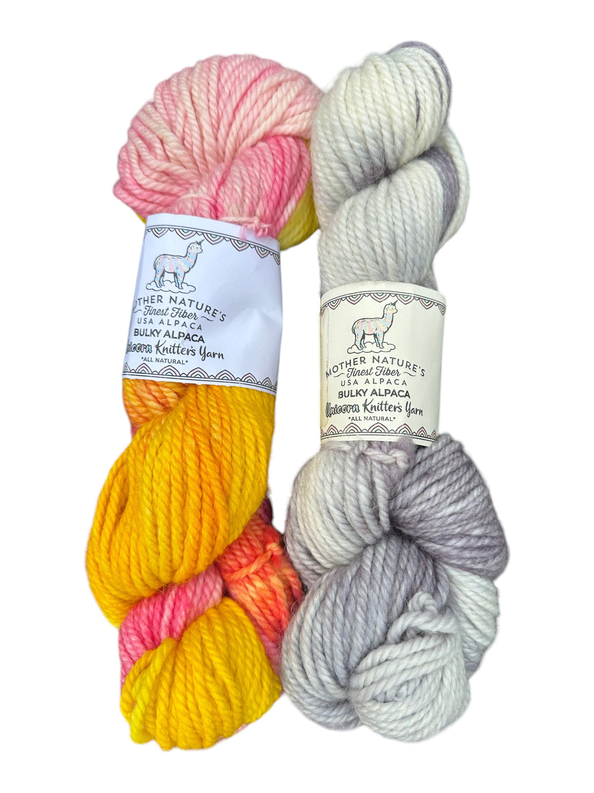 Oak Crest Alpacas and More chunky alpaca and merino yarn skeins in vibrant sunset and soft grey variegated colors.