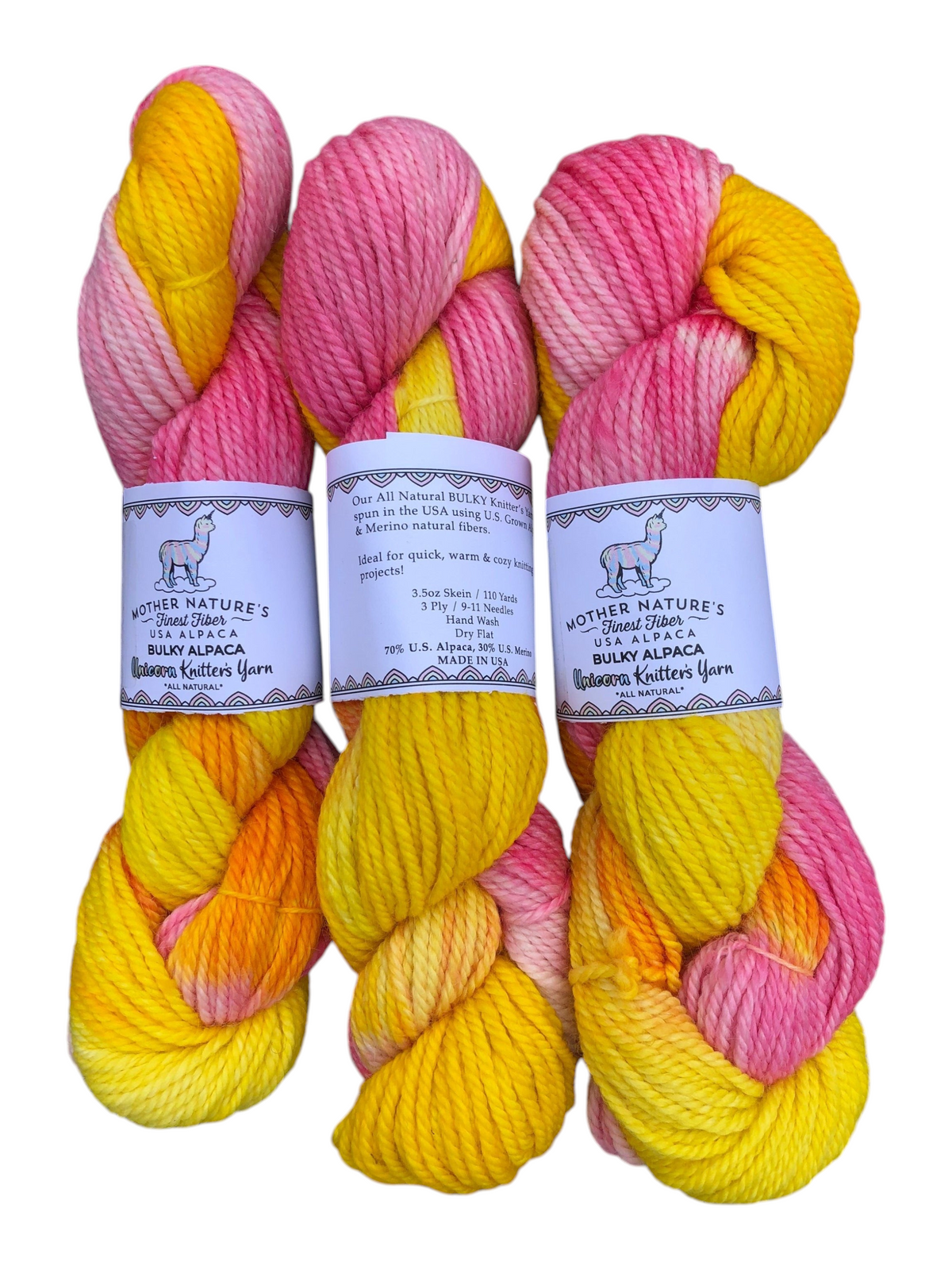 Oak Crest Alpacas and More chunky 3-ply yarn skeins in a vibrant pink, orange, and yellow variegated colorway.