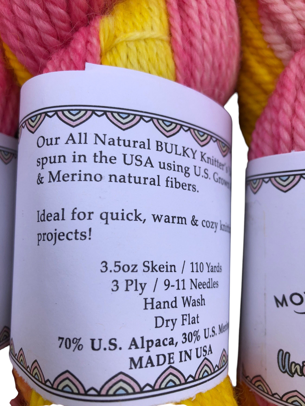 Oak Crest Alpacas and More chunky 3-ply yarn skein in pink and yellow, made from 70% USA alpaca and 30% merino wool.